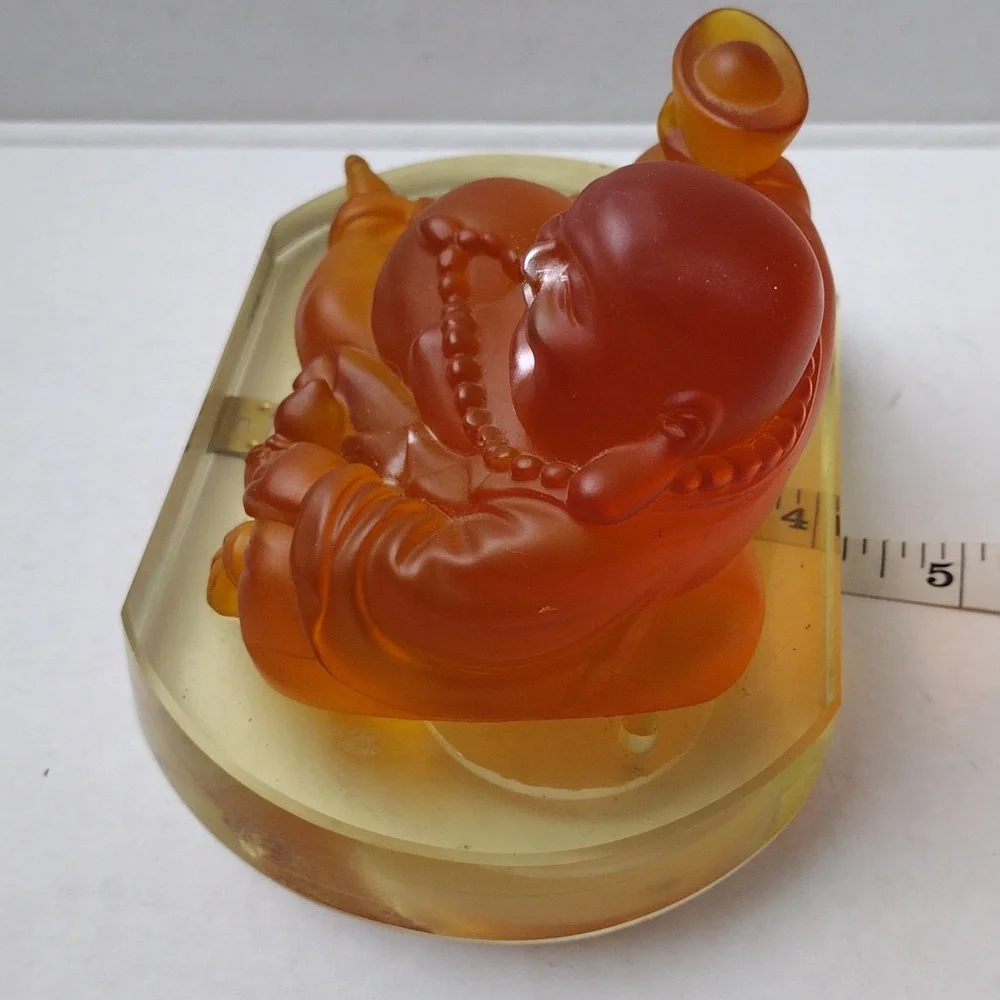 Orange Buddha Figurine